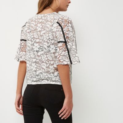 White lace floral flared sleeve top